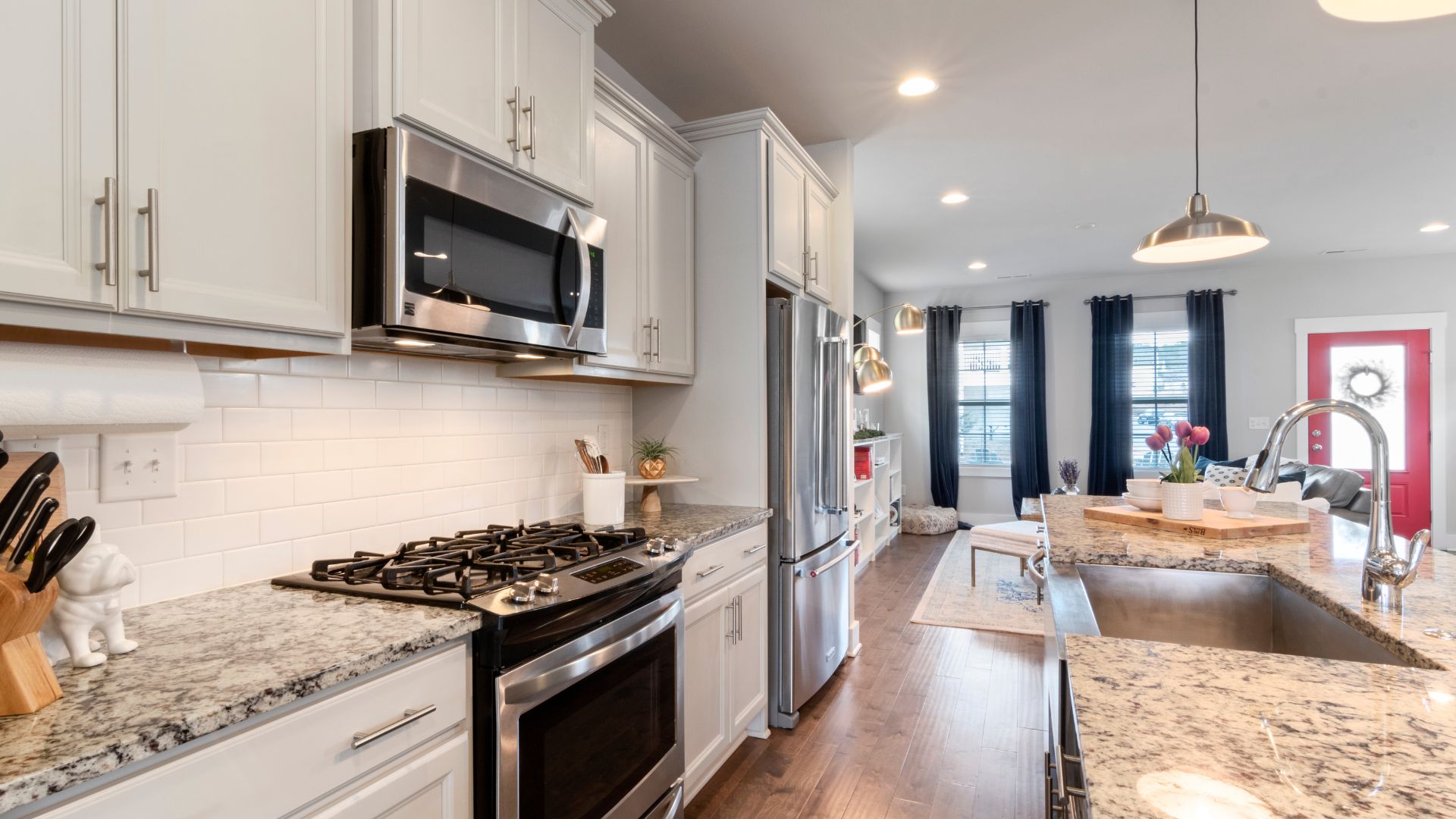 A kitchen with a stove top oven next to a counter